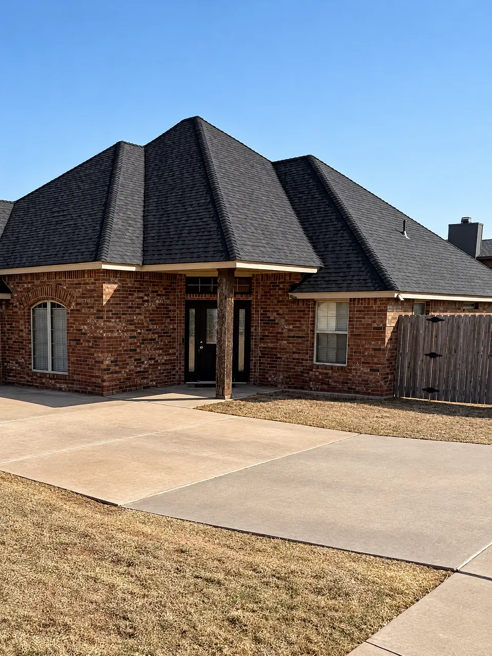 Residential roof on a brick home